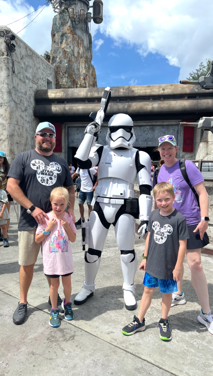 Rick Wank and family in Disney Land on a hot summer day.
